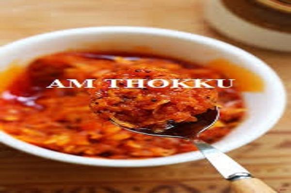 Traditional Mango Thokku – Authentic South Indian TasteTraditional Mango Thokku is a classic South Indian delicacy made from finely grated fresh raw mangoes blended with aromatic spices and pure edible oil. Prepared using age-old home-style recipes, this thokku captures the perfect balance of spicy heat, tangy sourness, and rich aroma, delivering a bold and comforting flavor that enhances every meal. The use of handpicked raw mangoes ensures a vibrant taste and natural freshness in every spoonful.Carefully seasoned with traditional spices such as red chilli, mustard, fenugreek, turmeric, and asafoetida, mango thokku is slow-cooked to allow the flavors to mature beautifully. The thick, coarse texture makes it an ideal accompaniment for rice, curd rice, dosa, idli, chapati, and even snacks. Prepared under hygienic conditions without artificial colors, this thokku reflects the authentic taste of homemade pickles enjoyed across generations.Packed in food-grade, airtight containers, Traditional Mango Thokku offers excellent shelf life while retaining its original flavor and aroma. Perfect for homes, hotels, restaurants, and specialty food stores, it brings the nostalgic essence of South Indian kitchens straight to your table.