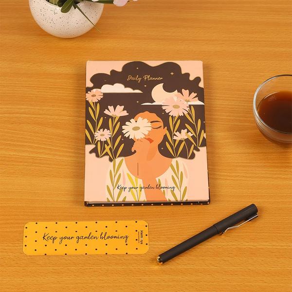 Memorys A5 Daily Planner - Lovely ThoughtsSize: A5 (148mm x 210mm)184 PagesHardbound Cover with Foil/UV & Velvet FinishIncludes 2 Sticker Sheets