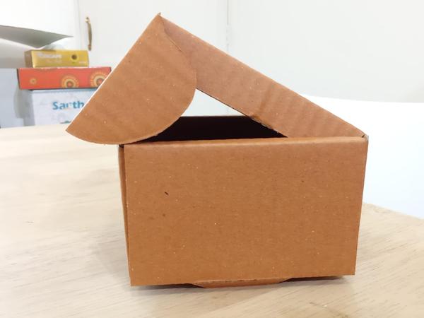 A “Miller Box” is a type of die-cut or self-locking corrugated mailer box, often used for e-commerce, gifts, and lighter-weight items. The specified box has a single-wall, 3-ply construction and dimensions of 4“ x 4” x 2.5“ (Length x Width x Height). DescriptionThe ”Miller Box“ is generally a one-piece folder (OPF) or tuck-in mailer style. It is delivered flat and folds together easily without the need for tape or glue (though tape is often used for security during shipping). The term ”Miller Box“ appears to be a regional or brand-specific name for a standard die-cut, self-locking mailer design rather than an internationally standardized box style code (like RSC - Regular Slotted Container). SpecificationsBox Type: Miller Box (Die-cut, self-locking mailer/folder style)Dimensions: 4” x 4“ x 2.5” (Length x Width x Height)Ply/Wall Grade: 3-Ply (Single Wall)This construction consists of one fluted (wavy) medium layer sandwiched between two flat linerboard sheets.Material: Corrugated fiberboard (cardboard), typically made from high-grade Kraft paper (often recycled content).Weight Holding Capacity: Generally suitable for light to medium-weight items, often less than 5 Kg.Color: Typically available in natural brown or white.Properties: Lightweight, durable, shock-absorbing, and typically 100% recyclable and reusable.Typical Applications: E-commerce shipping, packaging small items, gifts & crafts, cosmetics, or electronic products. 