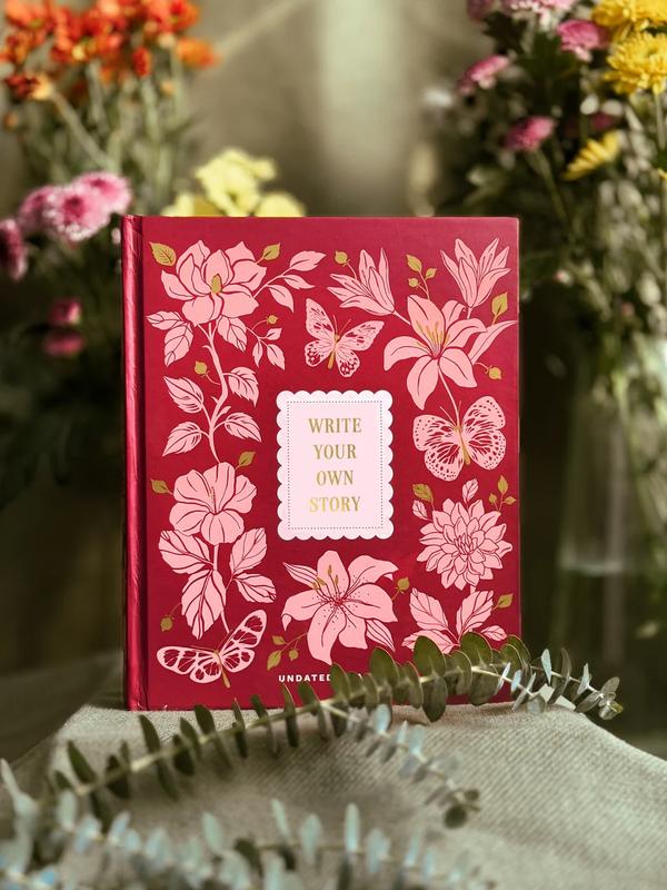 Annual Undated Planner - Write Your Own StoryOur annual undated planner is thoughtfully designed to help you live your best life. With its undated layout, you can start planning whenever you're ready, allowing you to set your own pace for the days, weeks and months ahead. Track your mental well-being, productivity, personal life, and physical health with dedicated worksheets for different aspects of life. Use it to set goals, track progress, and celebrate your achievements. Inspired by the vibrant colors of nature and the objects around us that often go unnoticed, every detail of this planner is like a breath of fresh air for your desk. With its colorful pages and uplifting quotes, you'll feel motivated to take action and create the life you desire.The planner comes in a luxurious hardbound box along with 5 thoughtful freebies:A pocket notebook to jot down everything on the goSet of 50 Journaling Prompt cards for guided journalingA notepad for your daily listsSet of 3 greeting cardsA Canvas pouch to hold all your essentials together