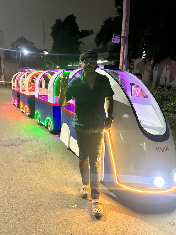 Electric Trackless Bullet Train Manufacturer – YAAN WORLD, Naroda AhmedabadBattery Charge Time  - 4-5 HR Battery Charging Time  - 4-5 hr Engine Dimension  - 8 ft x 4 ft x 6 ft Running Time  - 70 km /charge 100% Country of Origin  - Made in India Availability  - In StockYAAN WORLD, based in Naroda, Ahmedabad, is a trusted manufacturer of high-quality Electric Trackless Bullet Trains designed for modern amusement, tourism, and commercial spaces. Our electric trackless bullet trains combine advanced technology, attractive design, and eco-friendly performance, making them ideal for malls, theme parks, resorts, zoos, exhibitions, gardens, and public attractions.Built with a strong iron body and premium FRP finishing, YAAN WORLD bullet trains ensure durability, safety, and smooth operation. These trains run on battery-powered electric systems, eliminating the need for tracks and reducing noise and pollution. The stylish bullet-train design attracts children and adults alike, enhancing visitor engagement and overall customer experience.Our electric trackless bullet trains are easy to operate, low maintenance, and customizable in terms of color, seating capacity, and branding. Equipped with reliable braking systems, comfortable seating, and efficient motors, they deliver excellent performance with maximum safety.At YAAN WORLD, we focus on innovation, quality manufacturing, and customer satisfaction. With timely delivery, competitive pricing, and after-sales support, we proudly serve clients across Ahmedabad, Gujarat, and all over India.YAAN WORLD – Driving the future of electric trackless amusement trains.