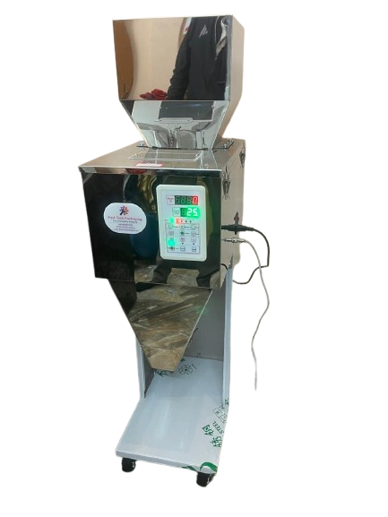 First Tech Packaging, Indore, we have an exclusive range of best quality at low-cost Semi Automatic Weigh Filler for Granules Weighing & Filling [10gm - 1 Kg] with highest weighing accuracy.It is the best in segment and highly used in small scale industries to save their time from manual weighing process. Highest Accuracy in Weighing along with Compact Size and also provides ease in process to use in packaging line. 