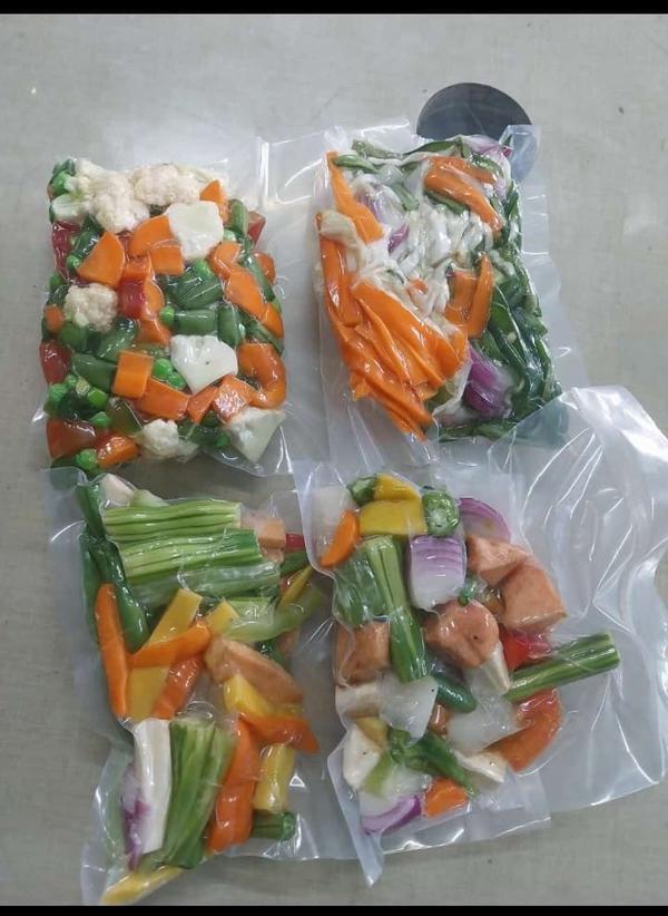 AM Vacuumed Mixed Vegetables are carefully selected from fresh, high-quality farm produce and processed using advanced vacuum sealing technology to lock in natural freshness, vibrant color, and essential nutrients. This method ensures that the vegetables retain their original taste, texture, and nutritional value without the need for artificial preservatives.Each pack contains a perfect mix of colorful vegetables, hygienically cleaned, cut, and vacuum packed to offer maximum convenience. Ready to cook and easy to use, AM Vacuumed Mixed Vegetables save valuable preparation time while delivering farm-fresh quality straight to your kitchen.The vacuum packing process helps extend shelf life naturally while preserving freshness and preventing contamination. This makes the product ideal for daily home cooking as well as for hotels, restaurants, catering services, and food processing units that require consistent quality and reliability.AM Vacuumed Mixed Vegetables are a healthy and nutritious choice, rich in natural vitamins, minerals, and fiber. With no added preservatives, additives, or artificial colors, they support a balanced diet while maintaining authentic vegetable taste.