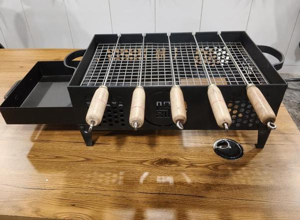 Dimension     -	20.5”  X  11.5”  X  7.5” HtWeight            -  5 KgSkewers          -  5 no. SS 304 Rods with wooden handleCharcoal Tray - RemovableGrill Mesh       - SS 304 GradeStand               -	FoldableFuel	                 - Charcoal or coconut shellPacking           -	Carton Box