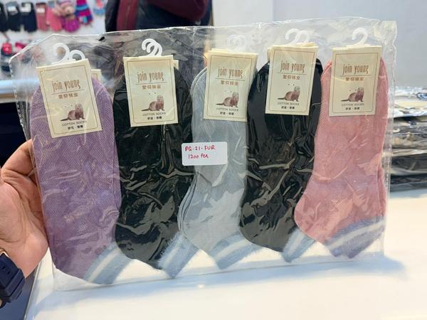 Wrap your feet in cozy elegance with our lady hair fur ankle socks. Crafted with ultra-soft, fluffy fibers, these socks provide gentle warmth, a plush feel, and a snug ankle fit that stays in place. Perfect for lounging, relaxing at home, or adding a touch of comfort to your day, they combine softness, style, and soothing comfort in every step.