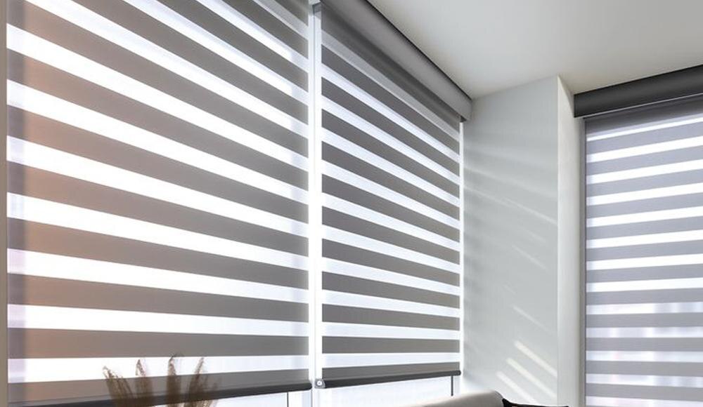 BT DECOR offers premium quality Zebra Blinds, designed to give your interiors a modern and elegant look while providing flexible light control. Also known as day and night blinds, zebra blinds feature dual-layer fabric with alternating sheer and solid stripes that allow you to adjust light and privacy effortlessly.Key Features of Zebra Blinds by BT DECOR✔ Dual-Layer Fabric Design – Smooth alignment of sheer and opaque stripes.✔ Flexible Light Control – Easily adjust brightness and privacy levels.✔ Modern & Premium Look – Perfect for contemporary interiors.✔ Smooth Operating System – Easy pull-chain mechanism for convenience.✔ Durable & Long-Lasting – High-quality fabric and strong fittings.✔ Custom Sizes & Colors – Wide range of designs to match your décor.Applications of Zebra BlindsLiving Rooms & BedroomsOffices & WorkspacesConference RoomsShops & ShowroomsHotels & Commercial SpacesAt BT DECOR, we focus on delivering window solutions that combine innovation, functionality, and style. Our zebra blinds are perfect for enhancing natural light control while maintaining privacy and comfort.Choose BT DECOR for elegant, durable, and professionally installed zebra blinds tailored to your space.