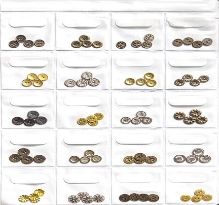 Fancy Metal Buttons. Crafted with precision and elegant detailing, these buttons are perfect for elevating garments and accessories with a sophisticated finish.