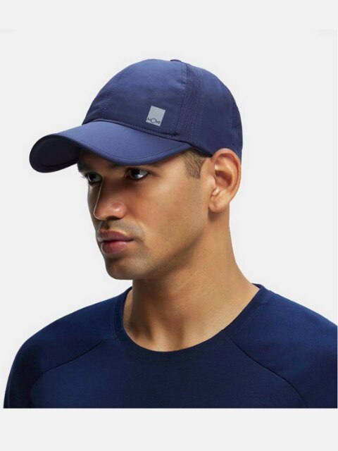 Designed to provide shade and comfort, this cap combines durability and style while showcasing the trusted name of Nishanth Enterprises.