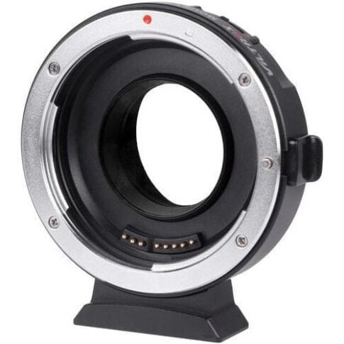This Lens Mount Adapter from Viltrox is designed to allow a Canon EF or EF-S-mount lens to be used with a Micro Four Thirds ( MFT ) camera with full electronic communication. The underside of this adapter’s detachable tripod foot is tapped with a 1/4″-20 accessory thread, providing direct attachment to tripods or quick release plates that feature 1/4″-20 mounts. For ease of upgrading its firmware, this adapter also includes a micro-USB port.