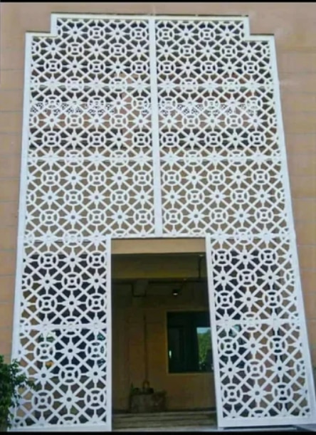 A GRC screen jali (Glass Reinforced Concrete jali) is a decorative and functional architectural element made from a lightweight and durable composite of concrete reinforced with glass fibers. These screens are known for their intricate designs, versatility, and ability to combine traditional aesthetics with modern durability