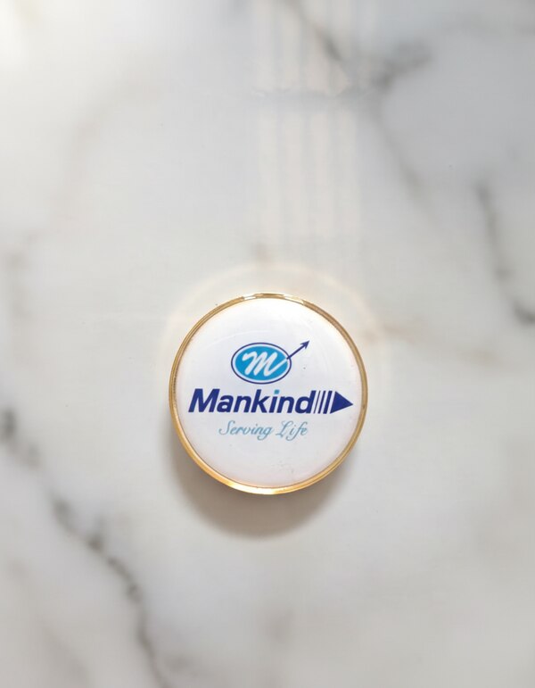 A premium magnetic company logo badge crafted with a sleek, polished finish, designed for easy attachment without damaging clothing.Featuring a crisp, high-resolution logo and durable build, it offers a professional, modern look ideal for corporate branding and everyday use.