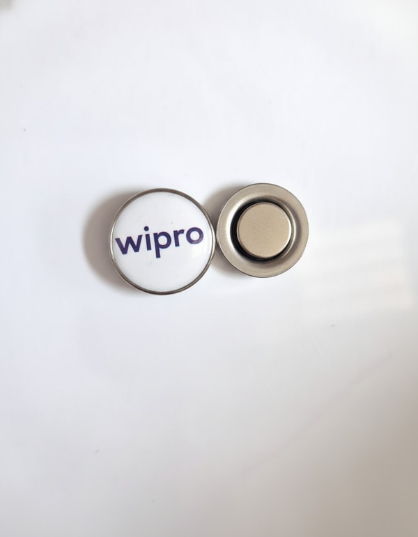 A premium magnetic company logo badge crafted with a sleek, polished finish, designed for easy attachment without damaging clothing.Featuring a crisp, high-resolution logo and durable build, it offers a professional, modern look ideal for corporate branding and everyday use.