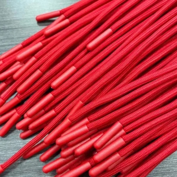 Drawcord Plastic Tipping, commonly referred to as plastic aglets, is an essential finishing solution used to enhance the durability, functionality, and appearance of drawcords. Widely applied in garments, footwear, bags, and various industrial products, plastic tipping ensures that the ends of drawcords remain intact, smooth, and easy to handle. This advanced finishing technique is a key component in modern manufacturing, offering both practical benefits and aesthetic value.What is Drawcord Plastic Tipping?Drawcord plastic tipping is the process of sealing the ends of a cord using high-quality plastic materials through heat sealing or injection molding techniques. The plastic tips, known as aglets, are securely attached to the ends of the drawcord, preventing fraying and enhancing the overall usability of the cord. These tips are available in different shapes, sizes, and finishes to meet diverse application requirements.High-Quality MaterialsPlastic tipping is manufactured using durable thermoplastic materials such as PVC, TPU, or other engineered polymers. These materials are chosen for their strength, flexibility, and resistance to wear and tear. The drawcord itself may be made from polyester, cotton, nylon, or blended fibers, ensuring compatibility with the plastic tips for long-lasting performance.Key Benefits of Plastic Tipping1. Prevents FrayingPlastic tipping effectively seals the ends of the drawcord, preventing unraveling and extending the lifespan of the product.2. Easy InsertionThe smooth and firm tip allows the drawcord to pass easily through eyelets, channels, and toggles without snagging.3. Enhanced DurabilityPlastic aglets protect the ends from damage caused by repeated use, washing, and environmental exposure.4. Improved Aesthetic AppealAvailable in a variety of colors and finishes, plastic tipping adds a clean, professional, and stylish look to drawcords.5. Better Grip & HandlingThe structured tip provides a better grip, making it easier for users to adjust the drawcord as needed.Advanced Manufacturing TechniquesModern plastic tipping is achieved using advanced technologies such as:Heat Sealing – Melting the plastic around the cord ends to create a tight sealInjection Molding – Precisely forming plastic tips over the cord ends for a premium finishDip Molding – Coating the cord ends with liquid plastic for a smooth and flexible finishThese processes ensure consistency, durability, and high-quality output in large-scale production.Wide Range of ApplicationsDrawcord plastic tipping is used across multiple industries, including:Garment Industry – Hoodies, sweatshirts, joggers, jackets, and sportswearFootwear Industry – Shoe laces for casual, athletic, and safety shoesBags & Accessories – Backpacks, drawstring bags, pouches, and travel gearSports & Outdoor Equipment – Tents, camping gear, and athletic accessoriesIndustrial Applications – Utility cords, packaging, and fastening solutionsCustomization OptionsPlastic tipping can be fully customized to match brand identity and product requirements:Custom colors and finishes (matte, glossy, transparent)Logo printing or embossing on agletsVarious shapes such as cylindrical, rectangular, or flat tipsDifferent sizes to match cord thicknessMetallic or dual-tone effects for premium designsDurability & PerformancePlastic-tipped drawcords are designed to withstand heavy usage and challenging environments. They offer:High resistance to abrasionExcellent color retentionResistance to moisture, chemicals, and UV exposureLong-lasting structural integrityThese features make them ideal for both everyday wear and industrial applications.Lightweight & Low MaintenanceDrawcord plastic tipping is lightweight and does not add significant bulk to the cord. It requires minimal maintenance and retains its finish even after multiple washes. The tips remain intact and do not crack or deform easily, ensuring long-term usability.Eco-Friendly InnovationsWith growing emphasis on sustainability, manufacturers are now offering eco-friendly plastic tipping solutions using recyclable or biodegradable materials. Environmentally responsible production processes further reduce the ecological footprint while maintaining product quality.Advantages of Drawcord Plastic TippingPrevents fraying and damageEnhances usability and performanceImproves product aestheticsSuitable for a wide range of applicationsCustomizable for brandingDurable and cost-effectiveConclusionDrawcord Plastic Tipping is a crucial finishing element that significantly enhances the performance and appearance of drawcords. By preventing fraying, improving ease of use, and adding a stylish touch, plastic aglets play a vital role in modern garment and accessory manufacturing. Their durability, customization options, and wide applicability make them a preferred choice for manufacturers across industries.For businesses seeking reliable and high-quality finishing solutions, drawcord plastic tipping offers the perfect combination of functionality, durability, and design excellence, ensuring superior product quality and customer satisfaction.