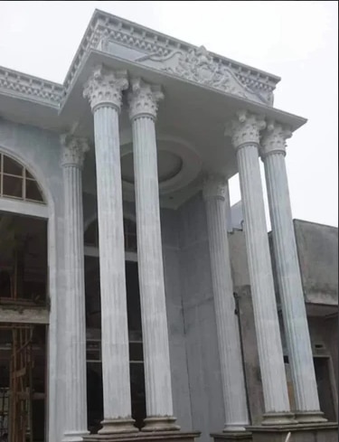 A GRC column capital refers to a decorative architectural element made from Glass Reinforced Concrete (GRC), used at the top of a column. GRC is a versatile material composed of concrete reinforced with glass fibers, offering durability, strength, and lightweight properties, making it ideal for intricate designs.