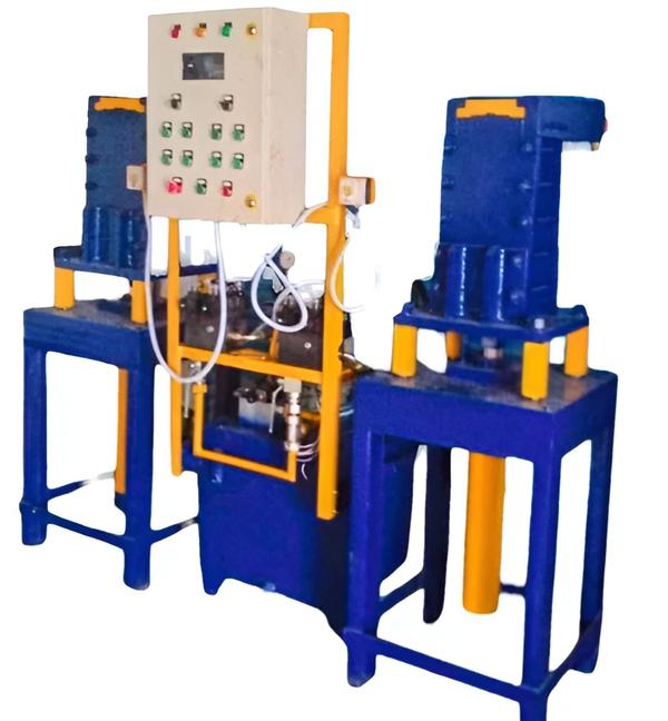 Automation Grade	                                 AutomaticMaterial	                                                     Mild SteelProduct Type	                                         Interlocking Block Making MachineColor	                                                         Blue (Base)Material Grade	                                         EN24Voltage	                                                     415vFrequency	                                                 50HzPower                                                          5KCapacity 	                                                 5000 Block Per DayWeight	                                                     2000KgThis Machine Has Two Separate Working Stations Powered By 10 Hp Hydraulic Power Pack.·         Each Station(Mold) Has The Separate Hand Operated Values To Activate Pressing And Lid Cylinders.·         By Proper Timing Of The Cylinder Operations Through A Valve, Maximum Production Can Be Achieved.Automatic Model:·         The Automatic Machine Can Be Easily Operated By Simple Pressing Of A Push Button For Each Cycle Of The Mold.·         The Cycle Logic Is Very Well Designed With A Plc Which Will Operate The First Station And Subsequently Next Station Will Start Operating On Its Own Without Any Time Delay.