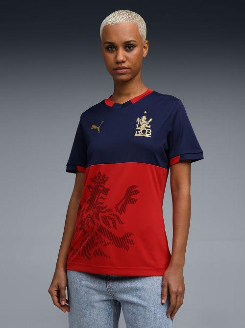 Sleeve: Short sleeveNeck: V-neckFit: SlimFabric: Knitted interlockPattern: ColorblockedPrint/Logo: RCB crest on chestPrint/Logo: PUMA Cat logo on chestdryCELL: Draws sweat away from the skin to keep you dry and comfortableRecycled Materials: Made with 100% recycled material excluding trims & decorationsWash with similar coloursExclusive of DecorationWash and iron inside outUse only mild detergent