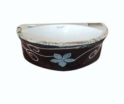 White Ceramic Wash Basin₹ 800/PieceGet Latest PriceMinimum Order Quantity: 10 PieceMaterial	CeramicWash Basin Type	Table Top BasinShape	RoundSize	10*16 InchUsage	Washroom Elevate your bathroom or kitchen with our stunning White Ceramic Wash Basin, designed to blend elegance with functionality. Crafted from high-quality ceramic, this wash basin features a sleek, glossy finish that not only enhances your space but is also easy to clean and maintain. Its spacious design provides ample room for washing, while the minimalist aesthetic complements any decor style. Upgrade your home with this stylish and durable wash basin that promises to be a focal point in your space.