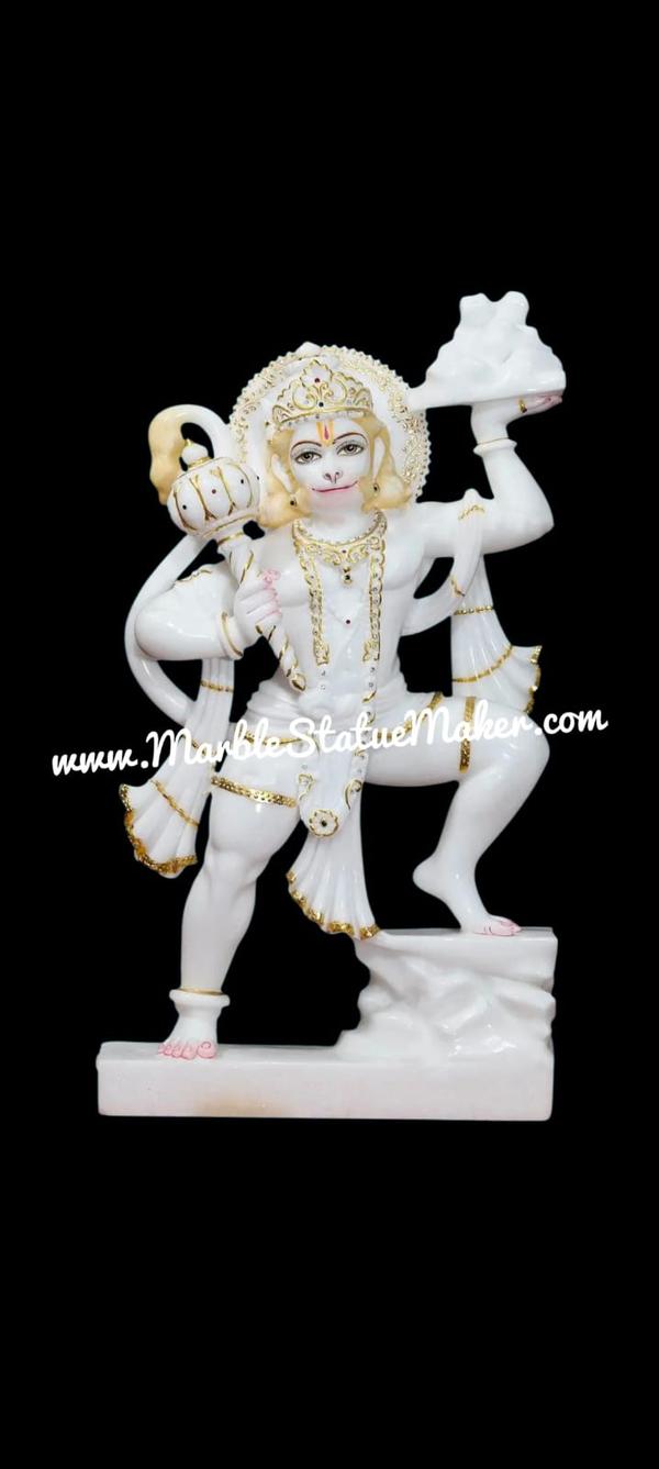 The Hanuman Ji Murti is a powerful symbol of strength, devotion, and divine protection. Lord Hanuman, the greatest devotee of Lord Rama, represents courage, loyalty, and selfless service. This beautifully handcrafted marble statue captures the divine energy and spiritual essence of Bajrang Bali, inspiring faith and positivity in every space.Expertly carved from premium quality marble, the murti showcases fine detailing, serene expressions, and traditional craftsmanship. Hanuman Ji is often depicted holding a gada (mace) or carrying the Sanjeevani mountain, symbolizing power, determination, and victory over obstacles.Ideal for temples, homes, and spiritual spaces, this Hanuman murti is believed to bring protection from negative energies, enhance confidence, and promote peace and prosperity.