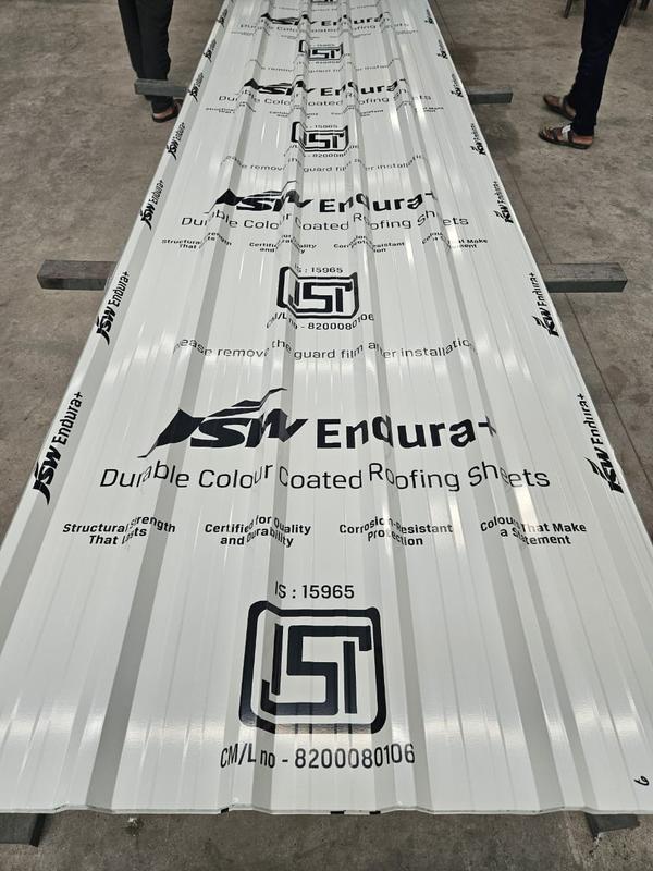 JSW Colour Coated Sheets are premium-quality roofing and cladding materials manufactured using high-grade steel from JSW Steel. These sheets are coated with advanced paint systems to provide superior corrosion resistance, durability, and aesthetic appeal, making them ideal for industrial, commercial, and residential applications.Key FeaturesManufactured using high-quality JSW steelSuperior color coating with long-lasting finishExcellent corrosion and weather resistanceUV-resistant and fade-resistant coatingHigh strength with lightweight structureEasy installation and low maintenanceAvailable in multiple profiles and colorsTechnical SpecificationsParameter	SpecificationBase Material	JSW Galvanized Iron (GI) / Galvalume SteelCoating Type	Color Coated (PE / SMP / PVDF)Sheet Thickness	0.30 mm – 0.80 mmEffective Width	750 mm – 1250 mmLength	Customizable (up to 12 meters)Zinc/Aluzinc Coating	80 GSM – 275 GSMPaint Coating Thickness	Top: 15–25 microns, Back: 5–10 micronsFinish Type	Glossy / Matte / TexturedColor Options	Red, Blue, Green, Grey, White, Brown, Custom RAL ShadesProfile Types	Corrugated / Trapezoidal / Tile ProfileTensile Strength	250 – 550 MPaYield Strength	140 – 300 MPaCorrosion Resistance	Excellent (suitable for coastal & industrial areas)UV Resistance	HighTemperature Resistance	Suitable for extreme weather conditionsWeight	Depends on thickness and profileAvailable VariantsJSW PPGI Colour Coated SheetsJSW PPGL (Galvalume) Colour Coated SheetsCorrugated & Trapezoidal Roofing SheetsTile Profile Colour SheetsApplicationsIndustrial roofing and claddingWarehouses and logistics parksCommercial buildings and mallsResidential housing projectsCold storage and prefabricated structuresAgricultural shedsAdvantagesLong-lasting color and gloss retentionHigh durability with minimal maintenanceExcellent resistance to rust and corrosionQuick installation and easy handlingCost-effective over long-term usageOptional AccessoriesSelf-drilling screws with EPDM washersRidge caps and flashingSealants and waterproofing materialsGutter and rainwater systemsWhy Choose Yogeshwar Profile Industries?Authorized sourcing of premium JSW Steel materialsAdvanced roll-forming and fabrication facilitiesCustom sizes, profiles, and colors availableStrict quality assurance and timely deliveryCompetitive pricing across India