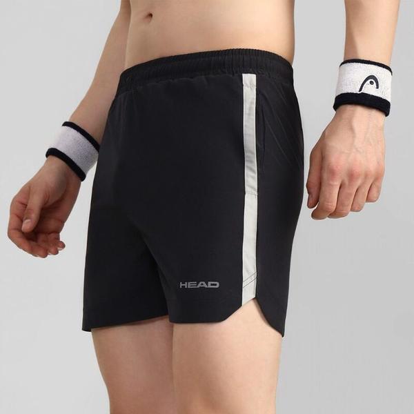 The HEAD HPS-1113 Shorts are designed using NS Lycra fabric combined with strategically placed knitted mesh inserts to enhance breathability and comfort. The moisture-wicking properties of the materials help draw sweat away from the skin, keeping players feeling dry and comfortable during intense training sessions or competitive matches. This performance-oriented construction supports unrestricted movement while maintaining a lightweight feel on the court. An elasticated adjustable waistband with an integrated drawcord ensures a secure and personalized fit. This flexible waistband design adapts comfortably to the body, allowing players to move freely during quick sprints, lunges, and directional changes without distraction. The adjustable feature provides added convenience, making the shorts suitable for both active play and everyday sportswear.For added practicality, the shorts include side hand pockets that offer convenient storage for small essentials such as tennis balls or personal items. A contrast stripe side insert enhances the overall design with a sporty and dynamic look, giving the HEAD HPS-1113 Shorts a modern aesthetic that complements their high-performance functionality.