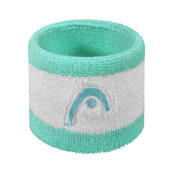 The HEAD wristband, crafted from 100% cotton, offers both durability and comfort with its soft, breathable texture. Featuring an embroidered HEAD logo, it combines functionality and style. The cotton material ensures superior sweat absorption, keeping the wearer dry and focused during intense physical activity. Its mild elasticity allows for a secure fit, making it suitable for prolonged use in various sports. Designed for high performance, the wristband enhances grip while providing essential moisture control, whether on the court for tennis, squash, or badminton. Available in a range of cool, vibrant colors, it seamlessly blends into any sports attire. This versatile accessory is a must-have for athletes seeking both practicality and flair in their gear.