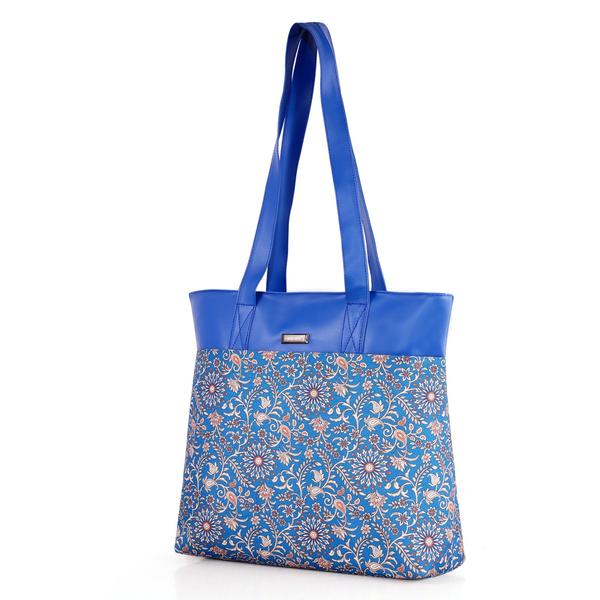 Upgrade your everyday style with this elegant and functional women’s tote handbag, designed for modern lifestyles. Crafted with premium vegan leather and beautifully handcrafted fabric, this bag blends durability with eye-catching aesthetics. The vibrant patterned exterior paired with a sleek solid top adds a sophisticated yet trendy touch—perfect for work, shopping, or casual outings.Designed with practicality in mind, this handbag features a spacious main compartment that comfortably fits your daily essentials like notebooks, tablet, wallet, and more. Inside, you’ll find a secure internal zipper pocket to keep valuables safe and organized. The back zip pocket allows quick access to frequently used items like your phone or keys, while the additional external zipper pockets enhance storage convenience.The sturdy zipper closure ensures everything stays secure, while the water-resistant inner lining protects your belongings from accidental spills. With strong dual shoulder straps, this bag offers comfortable carrying throughout the day without compromising on style.Lightweight yet durable, this tote is ideal for women who need a reliable everyday bag with a fashionable edge. Whether you're heading to the office, college, or a casual day out, this handbag delivers the perfect balance of utility and elegance.