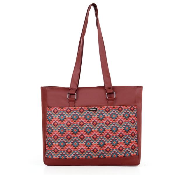 Upgrade your everyday style with this elegant and functional women’s tote handbag, designed for modern lifestyles. Crafted with premium vegan leather and beautifully handcrafted fabric, this bag blends durability with eye-catching aesthetics. The vibrant patterned exterior paired with a sleek solid top adds a sophisticated yet trendy touch—perfect for work, shopping, or casual outings.Designed with practicality in mind, this handbag features a spacious main compartment that comfortably fits your daily essentials like notebooks, tablet, wallet, and more. Inside, you’ll find a secure internal zipper pocket to keep valuables safe and organized. The back zip pocket allows quick access to frequently used items like your phone or keys, while the additional external zipper pockets enhance storage convenience.The sturdy zipper closure ensures everything stays secure, while the water-resistant inner lining protects your belongings from accidental spills. With strong dual shoulder straps, this bag offers comfortable carrying throughout the day without compromising on style.Lightweight yet durable, this tote is ideal for women who need a reliable everyday bag with a fashionable edge. Whether you're heading to the office, college, or a casual day out, this handbag delivers the perfect balance of utility and elegance.