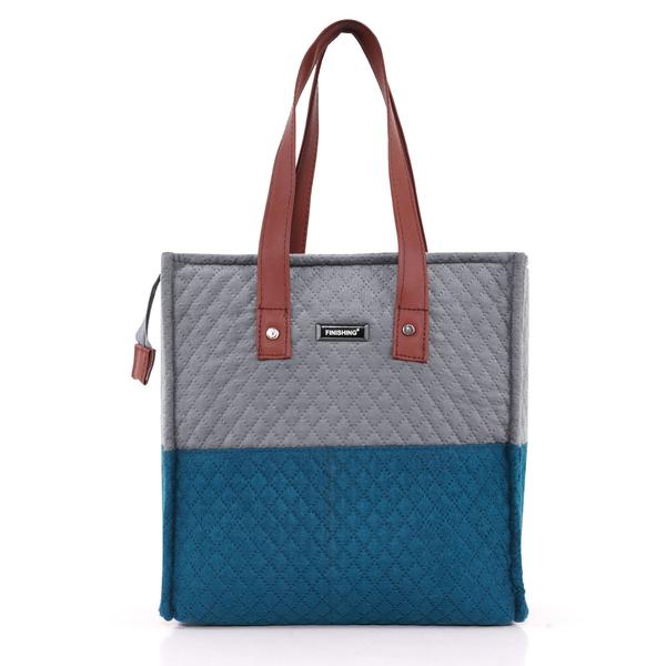 Add style and functionality to your everyday collection with this elegant women’s quilted tote handbag. Designed with a premium textured finish and modern two-tone color combination, this handbag offers a sophisticated look perfect for office, shopping, college, or casual outings.Crafted from high-quality durable material, the bag features a spacious interior that easily accommodates your daily essentials such as wallet, phone, cosmetics, notebook, and other accessories. The structured design helps the bag maintain its shape while offering long-lasting durability.Equipped with sturdy dual shoulder handles in a rich tan finish, this handbag provides comfortable carrying throughout the day. The secure zipper closure keeps your belongings safe, while the lightweight construction makes it ideal for regular use.Its stylish quilted pattern and sleek silhouette make it a versatile accessory that complements both traditional and western outfits. Whether you are heading to work or out for a casual day, this handbag adds elegance to every look.