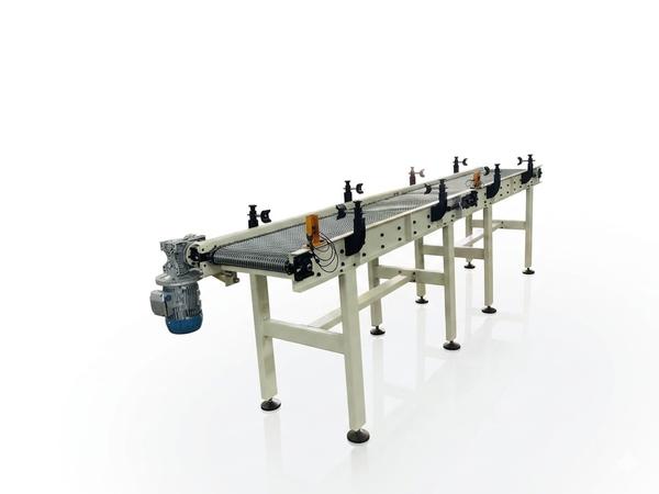 Rudra Engineering Solutions offers high-quality Mesh Chain Conveyors designed for efficient and reliable material handling across various industrial applications. These conveyors use a durable metal mesh chain belt, making them ideal for processes that require airflow, drainage, or operation in high-temperature and harsh environments.Our mesh chain conveyors are engineered to handle a wide range of products, including food items, automotive components, metal parts, and industrial goods. The open mesh design allows easy cleaning, better ventilation, and smooth product movement, making it especially suitable for drying, cooling, washing, and heating processes.Manufactured using premium-grade materials such as stainless steel or high-strength alloy steel, our mesh chain conveyors ensure long service life, corrosion resistance, and minimal maintenance. The system can be customized in terms of width, length, speed, and load capacity to meet specific customer requirements.Key Features:मजबूत और durable mesh chain designHigh temperature and corrosion resistanceSmooth and continuous operationEasy cleaning and low maintenanceCustomizable size, speed, and load capacityApplications:Food Processing Industry (bakery, snacks, freezing lines)Automotive & Engineering ComponentsHeat Treatment & Drying SystemsWashing & Cooling LinesPackaging & Material Handling SystemsRudra Engineering Solutions is committed to delivering innovative and customized conveyor solutions that improve productivity, efficiency, and operational reliability.