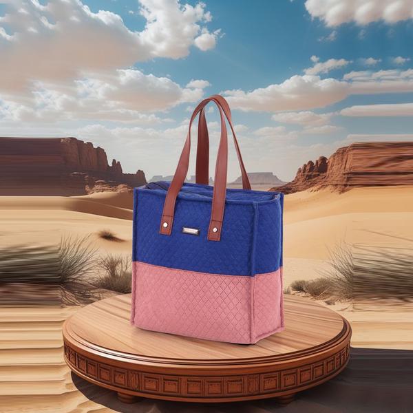 Add style and functionality to your everyday collection with this elegant women’s quilted tote handbag. Designed with a premium textured finish and modern two-tone color combination, this handbag offers a sophisticated look perfect for office, shopping, college, or casual outings.
Crafted from high-quality durable material, the bag features a spacious interior that easily accommodates your daily essentials such as wallet, phone, cosmetics, notebook, and other accessories. The structured design helps the bag maintain its shape while offering long-lasting durability.
Equipped with sturdy dual shoulder handles in a rich tan finish, this handbag provides comfortable carrying throughout the day. The secure zipper closure keeps your belongings safe, while the lightweight construction makes it ideal for regular use.
Its stylish quilted pattern and sleek silhouette make it a versatile accessory that complements both traditional and western outfits. Whether you are heading to work or out for a casual day, this handbag adds elegance to every look.
