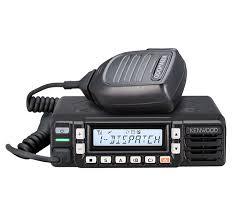 Basic Overview
Type: VHF Mobile Radio (Vehicle / Base Use)
Frequency: 136–174 MHz
Power Output: Up to 50W
Use: Fleet communication, security, transport, industrial use

👉 “DM” model = DMR Digital + Analog FM supported

📶 Communication Modes
✔️ Analog
FM Conventional communication
✔️ Digital (DMR – main feature)
DMR Tier II (licensed / conventional)
2-slot TDMA technology → 1 frequency = 2 talk channels
Mixed mode (Analog + Digital together)
⚙️ Core Features
260 Channels / 128 Zones (large network support)
6W loud audio output (clear voice in noisy areas)
LCD Display (backlit) with channel & ID info
7-color LED indicator for status alerts
Emergency button (SOS / alert function)
📡 DMR Digital Features (Main Advantage)
Dual Slot Direct Mode (two conversations without repeater)
Call Interruption (priority override)
Auto Slot Selection
Enhanced Encryption (secure communication)
Text messaging / status messaging
🔄 Advanced Functions
Site roaming (auto network switching)
Remote stun / kill / check (radio control)
Lone worker safety feature
Priority & zone scanning