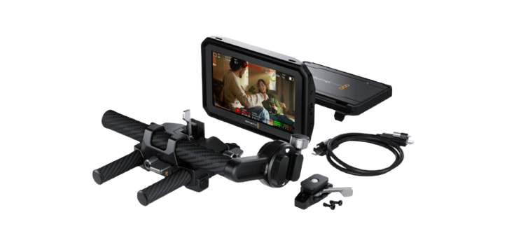 The PYXIS Monitor EVF Kit from Blackmagic Design is a versatile, high-brightness monitor solution compatible with the Blackmagic PYXIS and URSA Cine cameras, as well as the Blackmagic Micro Studio Camera 4K G2 using firmware version 9.6 or above. It performs much more than just an external display; it also functions as a powerful camera extension with a touchscreen interface, allowing users to control all camera features. With multiple mounting points, the monitor can be easily attached to the camera as a large viewfinder or mounted on a rig for improved focusing and framing. Featuring a 5“ LCD touchscreen, the PYXIS Monitor is ideal for use as a viewfinder for more accurate focusing and framing. This EVF kit comes with a clip-on sunshade, fixed and swivel mounts, a dovetail shoe with mounting screws, an EVF bracket rod mount, an EVF rotating bracket with a 19mm carbon fiber rod, two short 15mm carbon fiber rods, and a USB-C viewfinder cable that connects to your camera.Constructed from durable machined metal, the PYXIS Monitor is built for professional applications. The versatile monitor can be employed as an assist station, allowing your crew to easily monitor shots from any position on the set, even when bright sunlight surrounds your area, as the monitor's 5” LCD touchscreen features 1500 cd/m² brightness that ensures clear visibility. The removable sunshade offers added protection and convenience. A bright tally light is visible from a distance during recording, and the monitor includes three customizable buttons for quick access to features like zebra, focus assist, and false color, designed for easy tactile navigation.