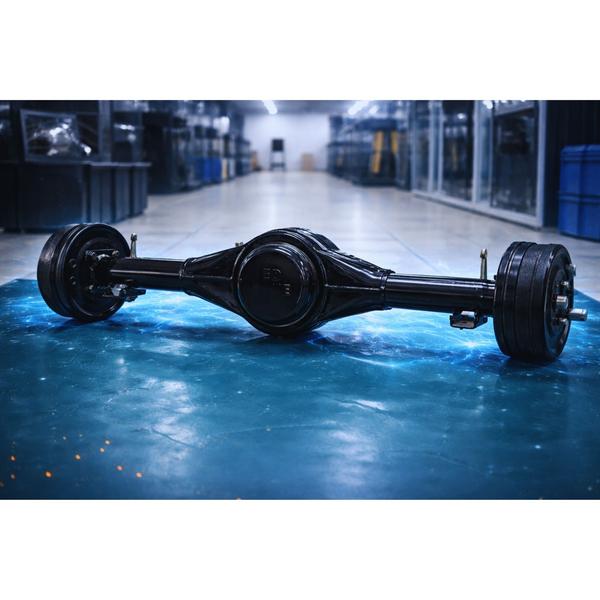 The 35-Inch Heavy-Duty Differential is a precision-engineered drivetrain component designed to provide superior torque management and balanced power distribution for high-performance electric and commercial vehicles. Measuring 35 inches in total width, this assembly is crafted from high-tensile, heat-treated steel to endure the intense mechanical stresses of heavy-load applications. Its primary function is to allow wheels on the same axle to rotate at different speeds—essential for smooth cornering and maintaining traction on uneven surfaces—while ensuring a consistent delivery of power from the motor. The single-speed internal gear configuration is optimized for mechanical efficiency, reducing energy loss and simplifying the overall drivetrain architecture for easier maintenance. The unit features a robust, weather-sealed housing that protects the internal precision gears from contaminants like dust, moisture, and road debris, ensuring long-term operational reliability in diverse environments. Engineered to minimize rotational vibration, this differential enhances vehicle stability and reduces wear on connected axle shafts and bearings. Its streamlined design allows for seamless integration into various chassis types, making it a reliable choice for manufacturers and technicians looking for a durable solution that balances high load capacity with smooth, quiet operation. By prioritizing structural integrity and precise gear meshing, the 35-Inch Differential delivers the mechanical dependability required for modern transport and industrial mobility.
