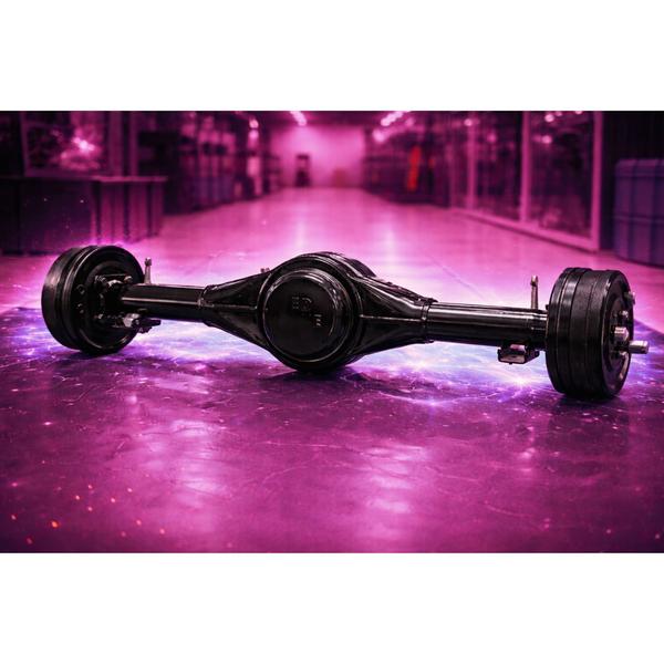 The 38-Inch Heavy-Duty Differential is a precision-engineered drivetrain component designed to provide superior torque management and balanced power distribution for high-performance electric and commercial vehicles. Measuring 38 inches in total width, this assembly is crafted from high-tensile, heat-treated steel to endure the intense mechanical stresses of heavy-load applications. Its primary function is to allow wheels on the same axle to rotate at different speeds—essential for smooth cornering and maintaining traction on uneven surfaces—while ensuring a consistent delivery of power from the motor. The single-speed internal gear configuration is optimized for mechanical efficiency, reducing energy loss and simplifying the overall drivetrain architecture for easier maintenance. The unit features a robust, weather-sealed housing that protects the internal precision gears from contaminants like dust, moisture, and road debris, ensuring long-term operational reliability in diverse environments. Engineered to minimize rotational vibration, this differential enhances vehicle stability and reduces wear on connected axle shafts and bearings. Its streamlined design allows for seamless integration into various chassis types, making it a reliable choice for manufacturers and technicians looking for a durable solution that balances high load capacity with smooth, quiet operation. By prioritizing structural integrity and precise gear meshing, the 38-Inch Differential delivers the mechanical dependability required for modern transport and industrial mobility.