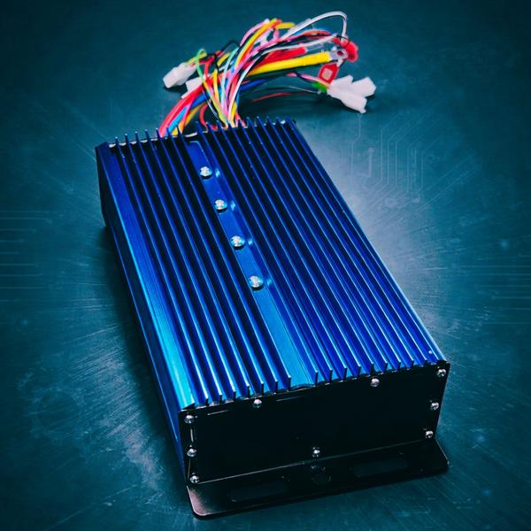 The CONTROLLER BLDC (PRO) is an advanced, high-performance power module designed for precision motor control in high-end electric mobility and industrial applications. Encased in a rugged, deep-blue anodized aluminum extrusion with integrated heatsink fins, this controller is engineered for extreme thermal management, ensuring sustained high-power output without thermal throttling. By utilizing superior Sine Wave FOC (Field-Oriented Control) algorithms, the PRO model provides exceptionally smooth and linear acceleration, near-silent motor operation, and maximized energy efficiency compared to standard controllers. This creates a highly refined user experience while extending the range of the battery pack. The unit features a comprehensive wire harness with high-quality, pre-terminated connectors for effortless integration with motors, batteries, throttles, and displays. Critically, it includes an integrated diagnostics panel with dedicated LED indicators for “Power Fault,” “Controller Fault,” “Throttle Fault,” and “Motor Fault,” allowing for immediate status verification and faster troubleshooting in the field. Built with premium automotive-grade MOSFETs and a sophisticated 32-bit microprocessor, the CONTROLLER BLDC (PRO) offers programmable parameters for regenerative braking, multiple power modes, and current limits. This controller represents a significant professional upgrade, delivering the precise control and robust reliability required for demanding applications where performance and durability are non-negotiable. Its sealed construction ensures resilience against dust and moisture, making it a dependable choice for serious electric drive system developers and operators.