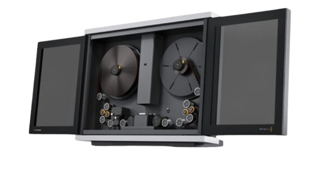 The Blackmagic Design Cintel Scanner G3 HDR+ is a complete solution for real-time film scanning and grading. It features precision mechanical film handling components, a high intensity diffuse light source, optics, and a built-in camera. The precision capstans handle film gently. The scanner includes a 35mm film gate, film spools, a set of four cleaning rollers, desk mount feet, and DaVinci Resolve Studio software. The scanner transfers film directly to DaVinci Resolve, which allows you to edit film rolls back together, grade and reframe scans, apply noise reduction, and extract audio. The ability to use DaVinci Resolve to operate the scanner ensures more creative control than possible with a hardware-only control solution.