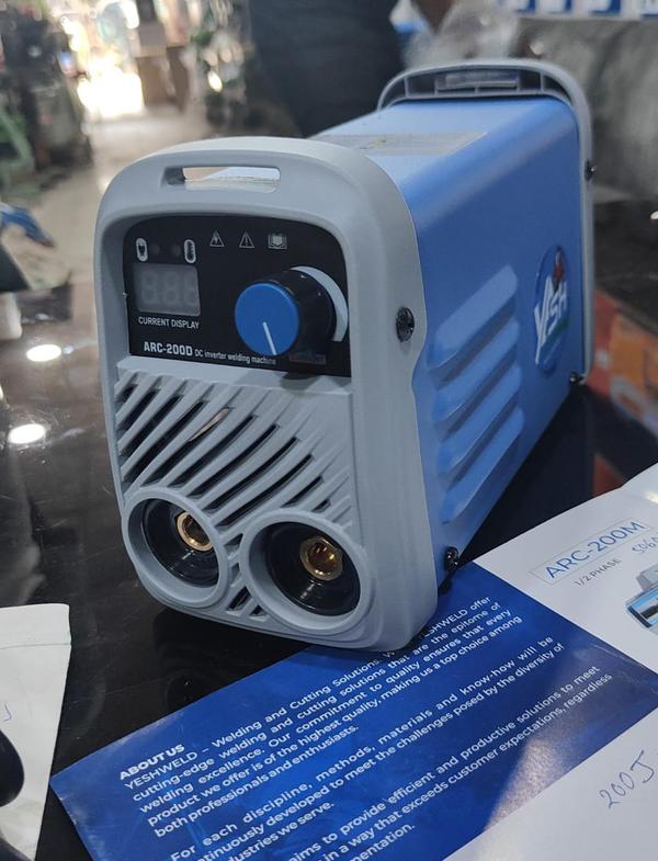 230V Single Phase Duty Cycle: 60% Electrodes: 2.5mm continuous, 3.15mm 2 hrs Digital display, Portable Great for home/workshop weldingWhat is an ARC-200D DC Inverter Welding Machine?The ARC-200D is an IGBT-based inverter welding machine that uses advanced electronic circuitry to convert electrical power efficiently, resulting in stable arc performance and reduced energy consumption. Unlike traditional bulky welders, inverter machines are lightweight, portable, and provide better control over welding parameters.With a typical output range of 20–200 amps, it is suitable for light to medium-duty welding applications across various industries.Key Features1. Advanced IGBT TechnologyThe ARC-200D uses high-frequency IGBT inverter technology, ensuring smooth arc ignition, stable welding, and improved efficiency compared to conventional machines.2. Compact & Portable DesignLightweight construction allows easy transportation and operation at different job sites, making it ideal for fieldwork and maintenance applications.3. Wide Current Range (20–200A)This flexibility enables welding of different material thicknesses and supports electrodes up to around 3.2 mm diameter.4. Stable Arc & Better Weld QualityFeatures like anti-stick, hot start, and arc force control help achieve smooth welding with minimal spatter and strong joint formation.5. Energy Efficient OperationInverter technology significantly reduces power consumption while maintaining high output efficiency.6. Built-in Safety ProtectionsEquipped with over-voltage, over-current, and thermal protection systems to ensure safe and continuous operation.ApplicationsThe ARC-200D DC inverter welding machine is widely used across multiple sectors:Fabrication and metal workshopsConstruction and infrastructure projectsAutomotive repair and maintenanceIndustrial maintenance workAgricultural equipment repairIts ability to weld materials like carbon steel, stainless steel, and low alloy steel makes it highly versatile.