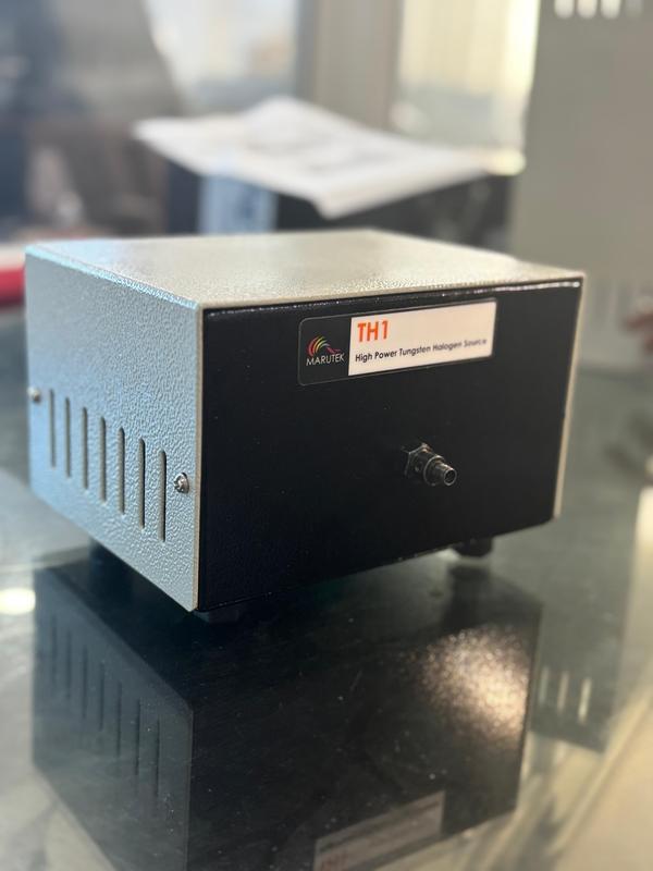The TH-1 Series of tungsten halogen light sources are versatile, white light lamp optimized for use in the VIS – NIR Range (360- 2500 nm).These light sources offer high color temperature , very efficient output ,and long bulb life.