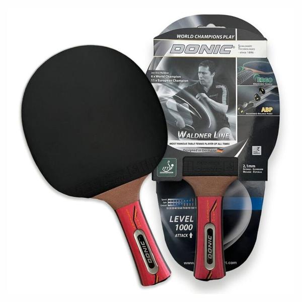 Waldner 1000 Table Tennis Bat - Level 1000 – Designed for Advanced Offensive Playhe Waldner 1000 is engineered for advanced players seeking to master a full range of techniques with high levels of spin and speed. Optimized for an aggressive playing style, this bat is ideal for those who demand both precision and power.TechnologiesAdjustable Balance Point (ABP): This innovative system allows players to customize the bat’s balance to suit their individual style of play.Head-Balanced: Shifts weight toward the top of the blade, generating greater power and acceleration for attacking strokes.Handle-Balanced: Moves weight closer to the handle for enhanced control, precision, and ease in executing spins and slices.Ergo Handle : The ergonomically shaped handle conforms naturally to the player’s hand, offering a seamless connection between hand and bat. The rounded design minimizes pressure points, delivering superior comfort and grip during extended play.