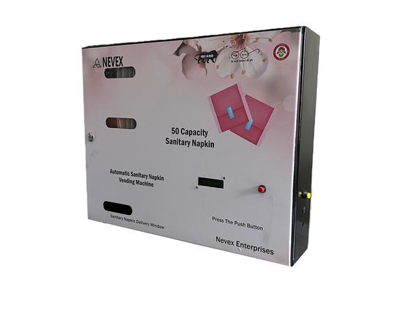 The 50 Capacity NEVEX Automatic Sanitary Pad Vending Machine is a smart and hygienic solution designed for schools, colleges, offices, factories, hospitals, malls and commercial spaces. This free-operated vending machine allows easy and quick dispensing of sanitary napkins through a simple push button mechanism, ensuring better menstrual hygiene management for women and girls.Built with a durable metal body and user-friendly design, the machine provides smooth automatic dispensing without the need for coins or UPI payments. It is ideal for organizations looking to offer free sanitary napkins as part of women empowerment and hygiene initiatives.  Product Features*Automatic sanitary pad dispensing system*Easy push button operation*Free dispensing mechanism for public welfare use*Compact and space-saving wall mounted design*Strong and durable MS powder coated body*Smooth and reliable performance*Hygienic and touch-friendly operation*Low maintenance and easy refill system*Suitable for high-traffic women washrooms*Ideal for CSR projects and government installations