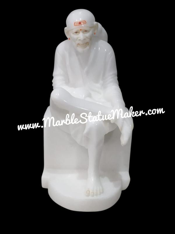Bring peace, positivity, and divine blessings into your home with this beautifully handcrafted Marble Sai Baba Murti. Expertly carved from premium quality marble by skilled artisans of Jaipur, this elegant statue captures the calm and compassionate presence of Sai Baba with intricate detailing and a smooth polished finish.Ideal for home temples, meditation spaces, spiritual décor, and gifting purposes, this Marble Sai Baba Murti symbolizes faith, devotion, and inner peace. The fine craftsmanship, vibrant hand-painted work, and durable marble material make it a perfect choice for daily worship and long-lasting decoration.Add a touch of spirituality and traditional artistry to your surroundings with this divine marble masterpiece.Marble Sai Baba Murti, Sai Baba Marble Statue, Marble Sai Nath Idol, Handmade Marble God Statue, Religious Marble Idol, Marble Moorti Jaipur, Sai Baba Sculpture, Spiritual Home Décor, Hindu Marble Statue.