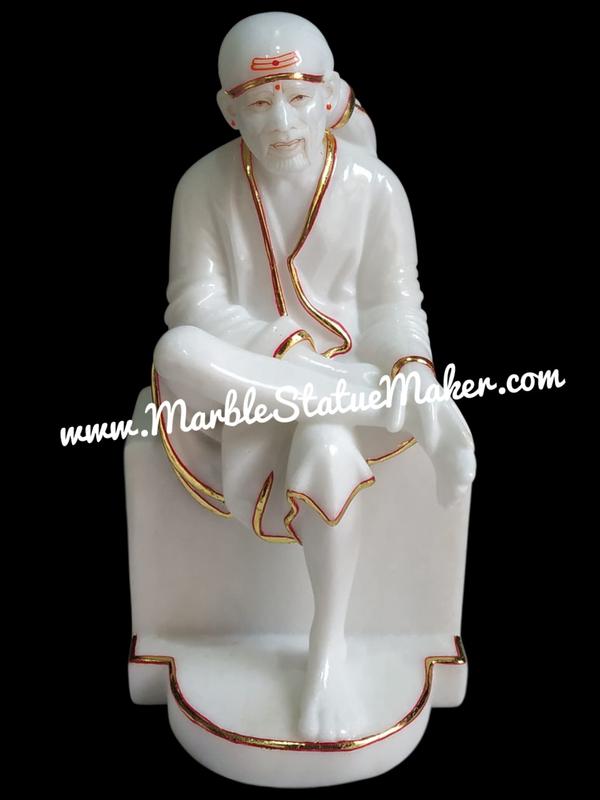 Bring peace, positivity, and divine blessings into your home with this beautifully handcrafted Marble Sai Baba Murti. Expertly carved from premium quality marble by skilled artisans of Jaipur, this elegant statue captures the calm and compassionate presence of Sai Baba with intricate detailing and a smooth polished finish.Ideal for home temples, meditation spaces, spiritual décor, and gifting purposes, this Marble Sai Baba Murti symbolizes faith, devotion, and inner peace. The fine craftsmanship, vibrant hand-painted work, and durable marble material make it a perfect choice for daily worship and long-lasting decoration.Add a touch of spirituality and traditional artistry to your surroundings with this divine marble masterpiece.Marble Sai Baba Murti, Sai Baba Marble Statue, Marble Sai Nath Idol, Handmade Marble God Statue, Religious Marble Idol, Marble Moorti Jaipur, Sai Baba Sculpture, Spiritual Home Décor, Hindu Marble Statue.