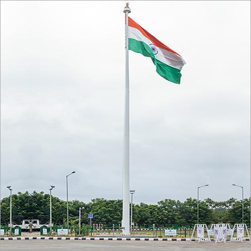 Flag Pole is manufactured using premium quality high tensile steel or stainless steel material with a strong tapered design for excellent durability, stability and elegant appearance. The pole is available in various heights ranging from 6 Meter to 45 Meter depending upon flag size and project requirements. Pole thickness is generally manufactured from 3 mm to 8 mm or as per structural and wind load design standards.
The pole is specially designed to withstand high wind pressure, continuous outdoor exposure and extreme weather conditions, making it suitable for government buildings, corporate offices, industrial areas, educational institutes, public spaces, memorial sites and commercial projects. The structure provides excellent balance and vibration resistance for smooth flag movement and long term performance.
The pole is hot dip galvanized with minimum 65 to 85 micron zinc coating for superior corrosion resistance and complete rust proof protection. Optional PU Paint, Powder Coating or Mirror Finish Stainless Steel polishing is provided for attractive appearance and additional weather resistance. The pole is supplied with heavy duty base plate, anchor foundation bolts, pulley system, rope arrangement and flag accessories for safe and easy installation.
Flag Pole offers high strength construction, premium finishing, low maintenance and long lasting durability with modern design and reliable structural performance for all types of flag mounting applications.

