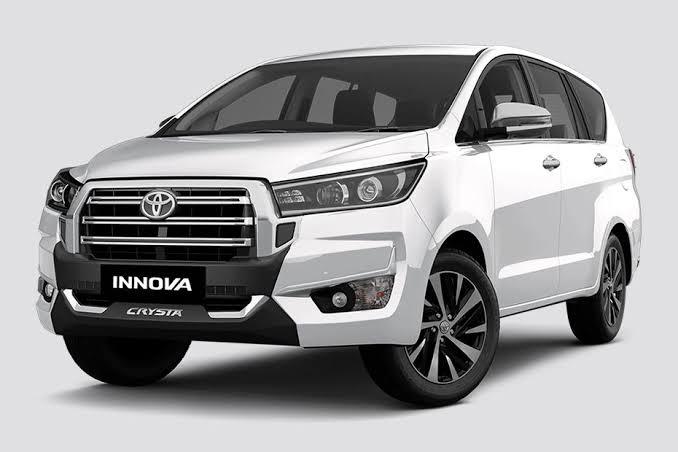 The Toyota Innova Crysta is a premium, rear-wheel-drive MPV known for its robust build, legendary reliability, and comfortable ride. Priced starting at ₹19.72 Lakh (ex-showroom), it features a powerful 2.4L diesel engine, an 8-inch touchscreen infotainment system, and top-tier safety, making it a benchmark for long-distance family and fleet travel.SpecificationsEngine: 2.4L Diesel (4-cylinder, BS6 Phase 2)Power & Torque: 148 bhp @ 3400 rpm, 343 Nm @ 1400 rpmTransmission: 5-speed Manual or 6-speed AutomaticDrive Type: Rear-Wheel Drive (RWD)Dimensions: 4735 mm (L) × 1830 mm (W) × 1795 mm (H) with a 2750 mm wheelbaseSeating Capacity: 7 or 8 seatsFuel Tank Capacity: 65 LitersKey FeaturesConvenience: Wireless smartphone charger, powered driver's seat, 8-inch touchscreen with Apple CarPlay and Android Auto, automatic climate control with rear AC, and a cooled upper glove box.Seating & Utility: Leather dual-tone seats (Hazel Brown and Black) and a foldable seatback table with cup holders in the second row.Safety: 7 airbags (including driver knee airbag), Vehicle Stability Control (VSC), Hill Start Assist, ABS with EBD, and a Tire Pressure Monitoring System (TPMS).Variants & PricingThe Innova Crysta is broadly available in three primary variants: GX, VX, and ZX.Base Price: Starts around ₹19.72 Lakh (Ex-showroom, depending on location).
