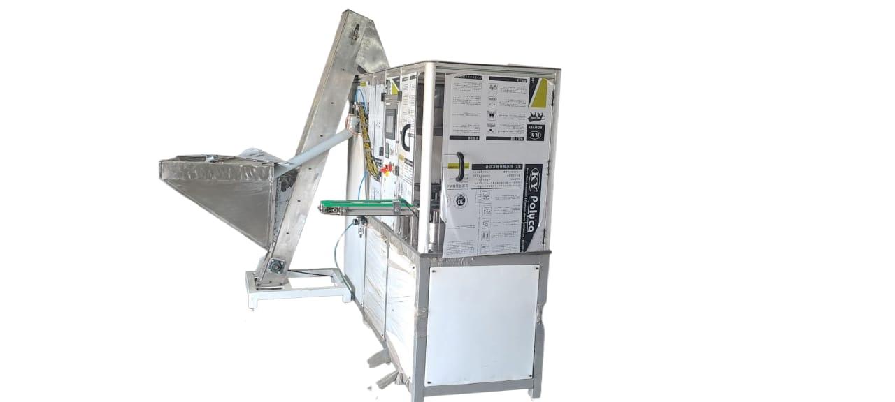 Cap Slitting And Folding Machine Manufacturer In NadiadCapacity : 350 caps/minUsage/Application : Slitting and foldingHeight Of Conveyor : 2200Cap folding slitting machine with loader