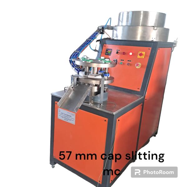 A 57 mm Cap Slitting Machine (Bottom Slitting Type) is a specialized machine used in cap manufacturing to create tamper-evident bands on plastic bottle caps. The machine cuts (slits) the lower section of the cap, separating the tamper band from the main cap while leaving small bridges intact.Main Purpose :- 1. Produces tamper-evident caps for bottles.2. Creates a breakable ring (security band) at the bottom of the cap.3. Commonly used for water, beverage, edible oil, pharmaceutical, and chemical bottle caps.Specifications for 57 mm Caps :-1. Cap Diameter: 57 mm2. Slitting Type: Bottom slitting3. Operation: Semi-automatic or automatic4. Output Capacity: Varies by machine design (typically several thousand caps per hour)5. Suitable Materials: HDPE, PP plastic caps