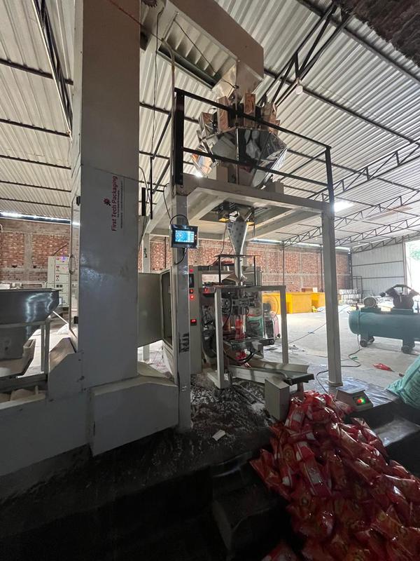 Refurbished Multi Head Weigher Machine in New-Condition with Complete Set [10-Head Weigher + 480mm Bagger + Mounting Structure + 1-Collar in desired pouch size + Z-Type Bucket Elevator]:Fully-Automatic Collar-Type Load-Cell based 10-Head Weigher Machine for Namkeen, Snacks, Wafers, Pulses, Granules, Whole-Spices, Dry-Fruits, Soya-Chunks, Grocery-Granules, Tea & Poha Pouch Packaging Packaging with Higher Accuracy and Speed as well. Heavy Duty Indian Make Multi Head Weigher Machine is available at Best-Price. 