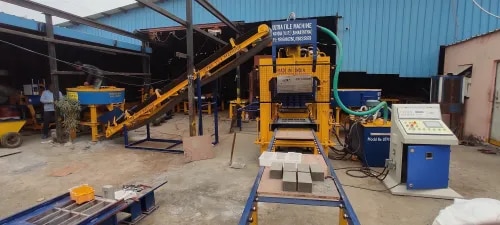 # 8 Cavity Fully Automatic Fly Ash Brick Making Machine## High-Production 8 Cavity Fully Automatic Hydraulic Fly Ash Brick Making MachineOur **8 Cavity Fully Automatic Fly Ash Brick Making Machine** is a high-performance, industrial-grade solution designed for manufacturers who require maximum production capacity, superior brick quality, and fully automated operation. Equipped with advanced hydraulic technology, a PLC-based control system, and precision-engineered components, this machine delivers exceptional productivity while minimizing labor costs and production time.Designed for continuous commercial production, the machine manufactures **8 fly ash bricks in every production cycle** with excellent dimensional accuracy, smooth surface finish, and high compressive strength. The fully automated system manages every stage of the manufacturing process, including raw material feeding, mould filling, hydraulic pressing, brick ejection, pallet transfer, and cycle control, ensuring consistent quality and efficient operation.Built with a heavy-duty mild steel frame and premium hydraulic components, this machine is engineered for long service life, low maintenance, and reliable performance in demanding industrial environments.## Key Features* Produces **8 fly ash bricks per cycle*** Fully automatic PLC-based control system with HMI touch screen* High-pressure hydraulic pressing for superior brick strength* Automatic material feeding and precise mould filling* Automatic brick ejection and pallet transfer system* Heavy-duty mild steel frame with robust construction* Precision-engineered interchangeable moulds* High production speed with consistent output* Energy-efficient hydraulic power pack* User-friendly operation and digital monitoring* Low maintenance and reliable performance* Safety features for secure and uninterrupted operation## Technical Specifications| Specification | Details || ------------------- | -------------------------------------------------------------------------------------------------- || Machine Type | Fully Automatic Hydraulic Fly Ash Brick Making Machine || Cavity | 8 Bricks Per Stroke || Automation Grade | Fully Automatic || Production Capacity | 3,000–4,000 Bricks Per Hour (depending on brick size, raw material mix, and production conditions) || Hydraulic System | High-Pressure Hydraulic Press || Control System | PLC with HMI Touch Screen || Motor Power | 18–25 HP (Model Dependent) || Voltage | 415V, 3 Phase, 50 Hz || Machine Structure | Heavy-Duty Mild Steel Construction || Mould Material | High-Grade Hardened Steel || Feeding System | Automatic || Brick Ejection | Automatic || Pallet Handling | Automatic || Maintenance | Low Maintenance || Installation | Complete Installation, Commissioning & Operator Training |**Note:** Production capacity and technical specifications may vary depending on machine model, brick dimensions, raw material quality, and operating conditions.## Raw Materials UsedThe machine is suitable for manufacturing high-quality fly ash bricks using:* Fly Ash* Stone Dust* M-Sand or River Sand* Cement* Lime* GypsumThe optimized hydraulic compaction system produces dense, durable, and eco-friendly bricks with excellent strength and dimensional accuracy.## Advantages* High production output with 8 bricks per cycle* Fully automatic operation with minimal manpower* Excellent compressive strength and brick quality* Uniform dimensions and smooth surface finish* Faster production cycle for increased efficiency* Reduced labor and production costs* Energy-efficient hydraulic system* Continuous operation with minimal downtime* Durable construction and long machine life* Easy maintenance and high return on investment## ApplicationsThe fly ash bricks produced by this machine are widely used in:* Residential Housing Projects* Commercial Buildings* Industrial Construction* Government Infrastructure Projects* Smart City Developments* Educational Institutions* Hospitals* Shopping Malls* Warehouses* Apartment Complexes* Boundary Walls* Roads and Public Infrastructure## Why Choose Our 8 Cavity Fully Automatic Fly Ash Brick Making Machine?Our **8 Cavity Fully Automatic Fly Ash Brick Making Machine** is manufactured using premium-quality materials and advanced engineering techniques to deliver exceptional productivity, consistent brick quality, and long-term reliability. Every machine is thoroughly tested before dispatch to ensure superior performance and dependable operation.We provide complete installation, commissioning, operator training, technical support, readily available spare parts, and prompt after-sales service to help our customers achieve uninterrupted production and maximum profitability.Whether you are expanding an existing brick manufacturing plant or setting up a new high-capacity production facility, our **8 Cavity Fully Automatic Fly Ash Brick Making Machine** offers the ideal combination of automation, efficiency, durability, and cost-effective performance for long-term business success.