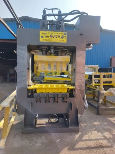 12 Cavity Fully Automatic Fly Ash / Concrete Brick Making MachineHigh-Performance 12 Cavity Fully Automatic Hydraulic Fly Ash & Concrete Brick Making MachineOur 12 Cavity Fully Automatic Fly Ash / Concrete Brick Making Machine is an advanced, high-capacity brick manufacturing solution designed for large-scale production with exceptional efficiency, precision, and reliability. Engineered with cutting-edge hydraulic technology, a PLC-based automation system, and premium-quality components, this machine is capable of producing 12 fly ash or concrete bricks per cycle, making it the ideal choice for commercial brick manufacturers and infrastructure projects.The machine performs the complete brick production process automatically, including raw material feeding, mould filling, hydraulic pressing, brick ejection, pallet transfer, and production cycle control. This fully automated operation minimizes manual labor, increases productivity, and ensures consistent brick quality with excellent compressive strength and dimensional accuracy.Manufactured from heavy-duty mild steel with precision-machined components, the machine is built for continuous industrial operation, offering long service life, energy-efficient performance, and low maintenance costs.Key FeaturesProduces 12 fly ash or concrete bricks per cycleFully automatic PLC-based control system with HMI touch screenHigh-pressure hydraulic compaction for maximum brick strengthAutomatic raw material feeding and accurate mould fillingAutomatic brick ejection and pallet transfer systemHeavy-duty mild steel frame with reinforced constructionPrecision-engineered hardened steel mouldsHigh-speed production with consistent qualityEnergy-efficient hydraulic power packUser-friendly control panel with real-time production monitoringLow maintenance and reliable long-term performanceIntegrated safety features for secure and uninterrupted operationTechnical SpecificationsSpecification	DetailsMachine Type	Fully Automatic Hydraulic Fly Ash / Concrete Brick Making MachineCavity	12 Bricks Per StrokeAutomation Grade	Fully AutomaticProduction Capacity	Up to 5,000–6,500 Bricks Per Hour (depending on brick size, raw material mix, cycle time, and operating conditions)Hydraulic System	High-Pressure Hydraulic CompactionControl System	PLC with HMI Touch ScreenMotor Power	25–35 HP (Model Dependent)Voltage	415V, 3 Phase, 50 HzMachine Structure	Heavy-Duty Mild Steel ConstructionMould Material	High-Grade Hardened SteelFeeding System	AutomaticBrick Ejection	AutomaticPallet Transfer	AutomaticMaintenance	Low MaintenanceInstallation	Complete Installation, Commissioning & Operator TrainingNote: Production capacity and technical specifications may vary depending on machine configuration, brick size, raw material quality, and production conditions.Suitable Raw MaterialsThe machine is suitable for manufacturing premium-quality fly ash and concrete bricks using:Fly AshCementStone DustM-Sand or River SandCrushed Stone AggregateLimeGypsumThe advanced hydraulic compaction process produces dense, durable, and dimensionally accurate bricks that meet modern construction requirements.AdvantagesHigh production capacity with 12 bricks per cycleSuitable for manufacturing both fly ash and concrete bricksFully automatic operation for maximum productivityExcellent compressive strength and dimensional accuracySmooth surface finish and uniform brick qualityReduced labor costs and improved operational efficiencyEnergy-efficient hydraulic systemContinuous production with minimal downtimeEasy operation through PLC and HMI controlsHeavy-duty construction for long service lifeLow maintenance and high return on investmentApplicationsBricks manufactured using this machine are ideal for:Residential Housing ProjectsCommercial BuildingsIndustrial ConstructionGovernment Infrastructure ProjectsSmart City DevelopmentsEducational InstitutionsHospitalsShopping MallsWarehousesApartment ComplexesBoundary WallsRoads and Highway ProjectsFactories and Industrial ShedsLarge-Scale Infrastructure and Public Utility ProjectsWhy Choose Our 12 Cavity Fully Automatic Fly Ash / Concrete Brick Making Machine?Our 12 Cavity Fully Automatic Fly Ash / Concrete Brick Making Machine is engineered to deliver superior productivity, outstanding brick quality, and dependable performance for high-volume manufacturing. Every machine is built using premium-grade materials and thoroughly tested to ensure durability, precision, and consistent operation under demanding production conditions.We provide complete installation, commissioning, operator training, technical guidance, readily available spare parts, and prompt after-sales service to ensure smooth and efficient plant operation. Our machines are trusted by construction material manufacturers across India for their advanced automation, robust construction, energy efficiency, and long-term reliability.Whether you are establishing a new brick manufacturing plant or expanding an existing production facility, our 12 Cavity Fully Automatic Fly Ash / Concrete Brick Making Machine provides the perfect combination of high production capacity, advanced automation, durability, and cost-effective performance to help your business grow.
