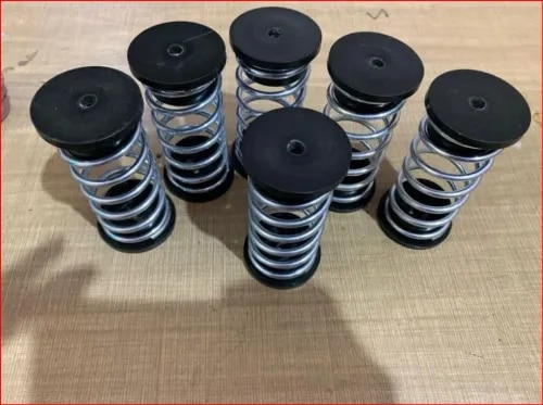 Gymnastic Spring Floor MountsSpecialized, high-cycle compression springs encased in a robust system to provide controlled deflection and rebound. They are the core component of professional spring floors, creating the necessary “give” for athlete safety and performance.Key Benefits:Provides consistent and predictable tension across the entire floor.Enhances athlete safety by absorbing impact shock.Engineered for high durability and millions of cycles.Designed to meet strict performance standards for competition.Primary Applications:Professional gymnastic floorsMartial Arts StudiosDance FloorsIndoor sports facilities